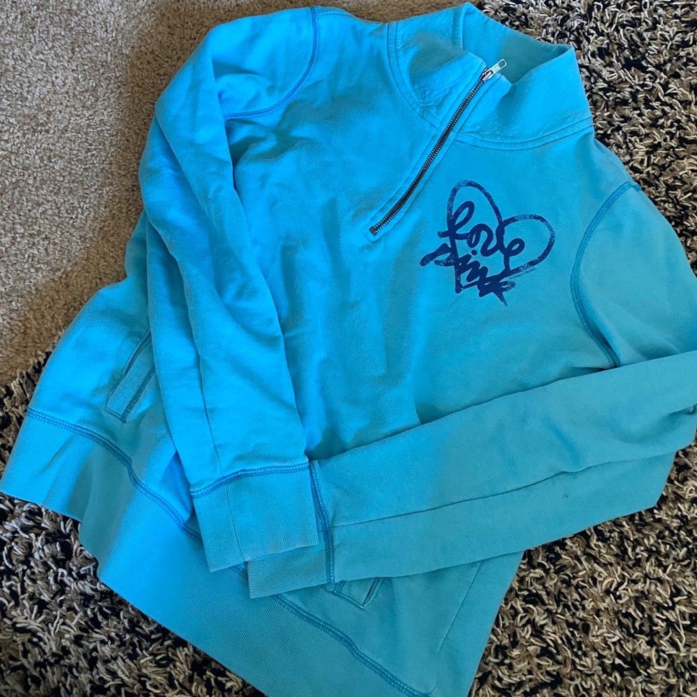 Light blue zip up jacket
